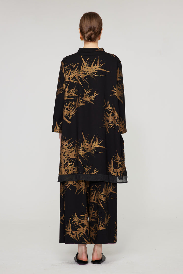 Conjunto de dos piernas anchas elegantes con estampado de hojas