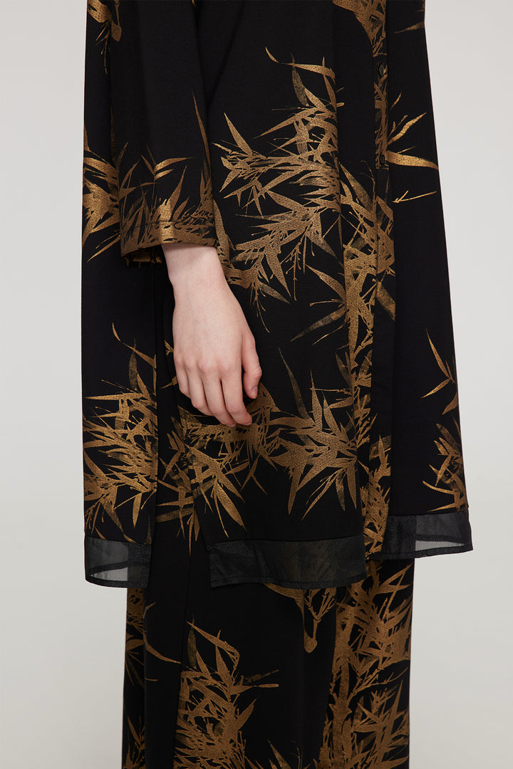 Conjunto de dos piernas anchas elegantes con estampado de hojas