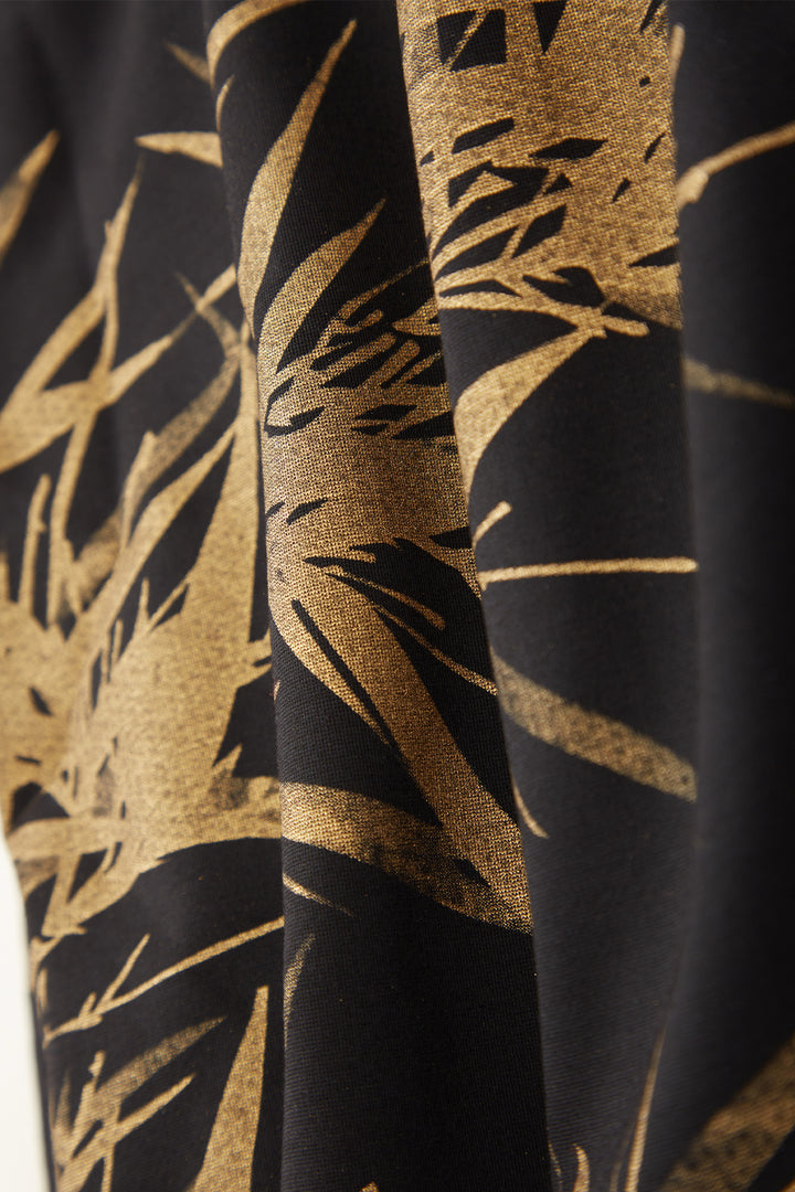 Conjunto de dos piernas anchas elegantes con estampado de hojas