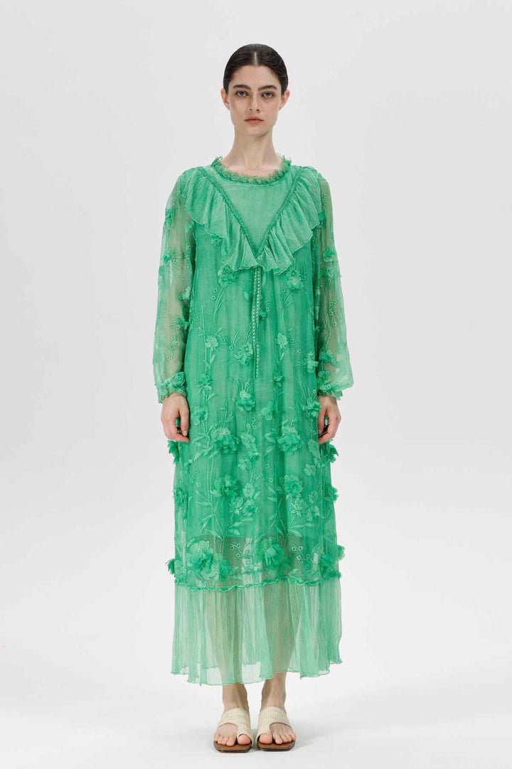 Sylvie geborduurde pure jurk