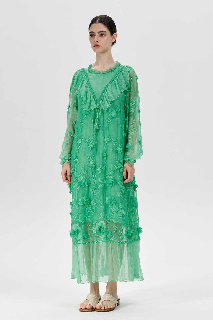 Sylvie geborduurde pure jurk