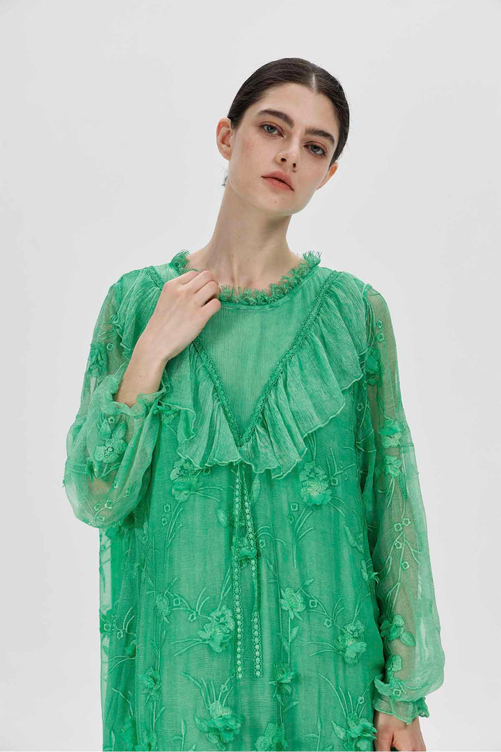Sylvie geborduurde pure jurk