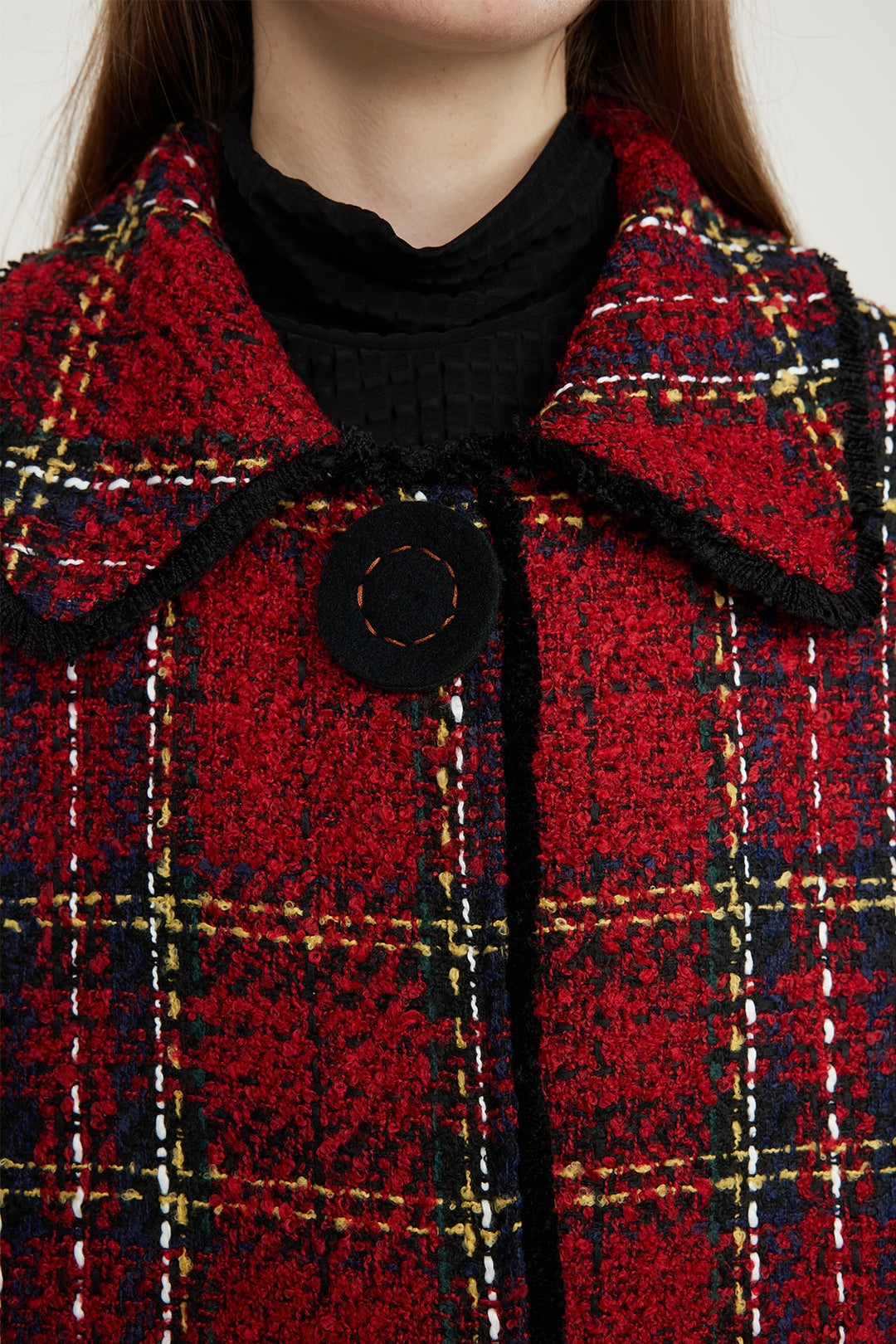 Manteau en laine à grille brodée